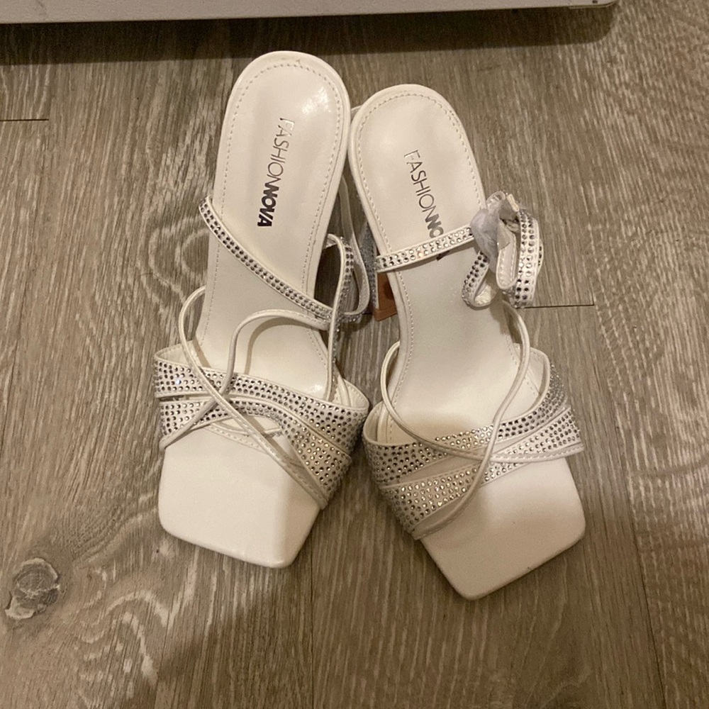 Brand new white heels embellished with silver